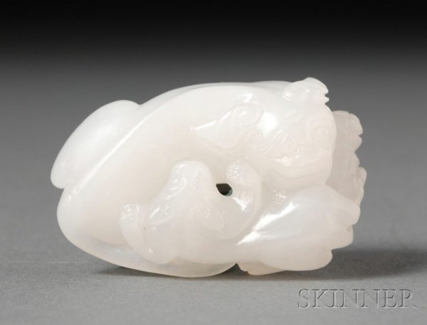 Jade Carving, stone of a pure white color, carved : Jade Carving, stone of a pure white color, carved as a pair of foo dogs, lg. 1 3/4 in.