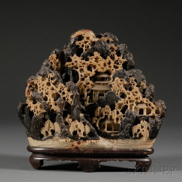 Soapstone Carving, China, 19th century, black and: Soapstone Carving, China, 19th century, black and tan stone carved as pavilions in a mountain landscape, wd. 11, lg. 10 in.