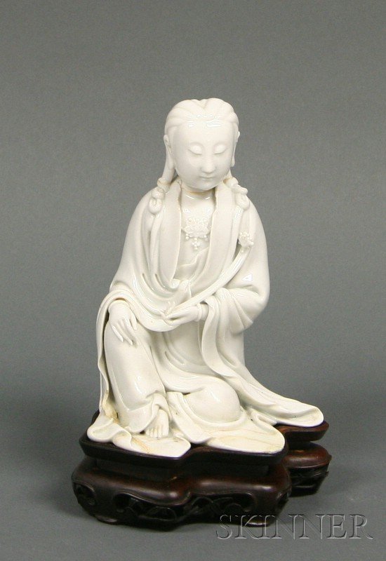 Blanc de Chine Figure, China, 18th century, Te Hua: Blanc de Chine Figure, China, 18th century, Te Hua image of a seated Kuan Yin holding a scepter, (loss).