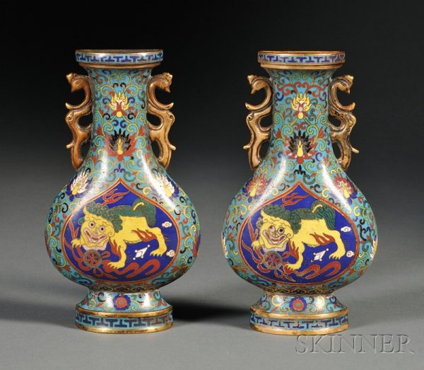 Pair of Cloisonne Wall Pockets, vasiform pockets w: Pair of Cloisonne Wall Pockets, vasiform pockets with phoenix handles, decoration of reserves of foo dogs on a cobalt blue ground surrounded by stylized lotus flowers on a turquoise ground, ht. 8 in.