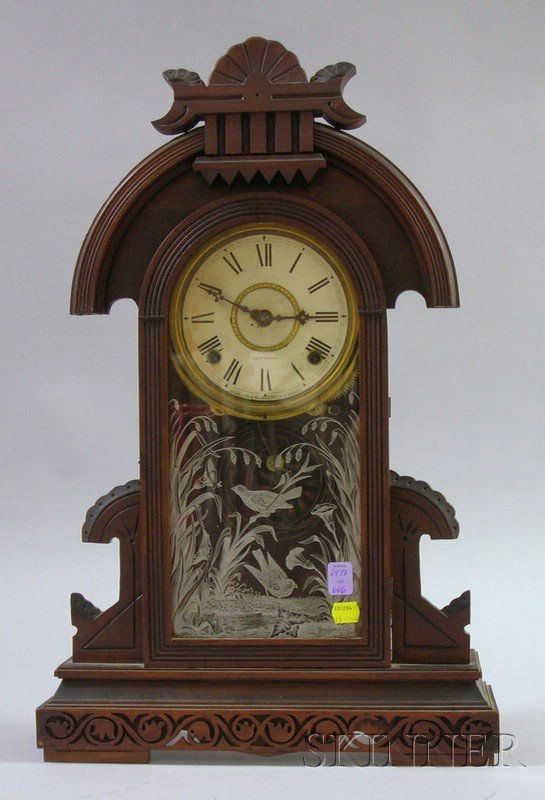 Walnut Mantel Clock by Seth Thomas, Thomaston, Con: Walnut Mantel Clock by Seth Thomas, Thomaston, Connecticut, with paper on zinc dial with Roman numerals and marked Seth Thomas, silver leaf transfer decorated tablet with two birds, pierced fret patte