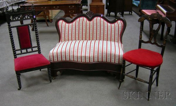 Three Pieces of 19th Century Seating, an Empire up: Three Pieces of 19th Century Seating, an Empire upholstered mahogany veneer settee, a black-painted Gothic Revival upholstered spool-turned slipper chair, and a Victorian black-painted and stencil dec