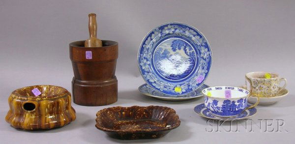 Ten Assorted Country and Decorated Ceramic Article: Ten Assorted Country and Decorated Ceramic Articles, a turned wood mortar and pestle, Rockingham glazed spittoon and square dish, a gilt "Health to Thee" porcelain cup and saucer, a large Blue Willow