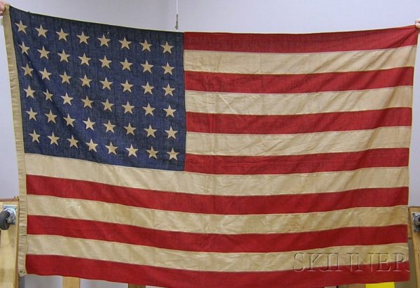 Machine-stitched and Printed Forty-eight Star Ameri: Machine-stitched and Printed Forty-eight Star American Flag, 1912-1951, stamped "Wear Ever," 46 x 69 in.