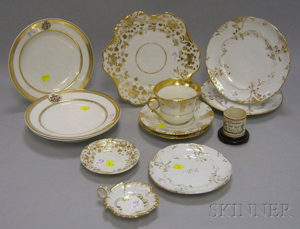 Twelve Pieces of P.T. Barnum's Personal Gilt Decora: Twelve Pieces of P.T. Barnum's Personal Gilt Decorated Porcelain Tableware, eight pieces with "PTB" monogram including three with hand-painted crest, along with a Staffordshire transfer motto decorate