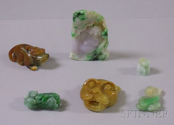 Six Asian Carved Stone Items, a brown lion/leopard: Six Asian Carved Stone Items, a brown lion/leopard pendant, a reclining mythical beast pendant, a green double animal pendant, a green and white child pendant, a large carved fat man pendant in green,