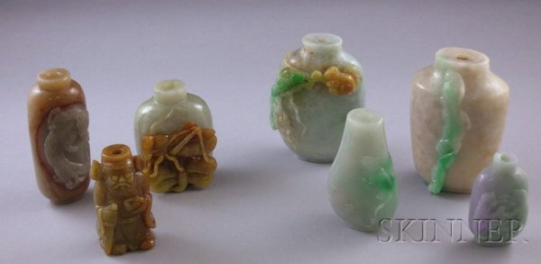 Seven Asian Carved Stone Snuff Bottles, a brown wi: Seven Asian Carved Stone Snuff Bottles, a brown with carved mythical beast, a green and brown carved cricket, a white and green carved bottle, a green and brown carved squirrel, a green carved bottle 