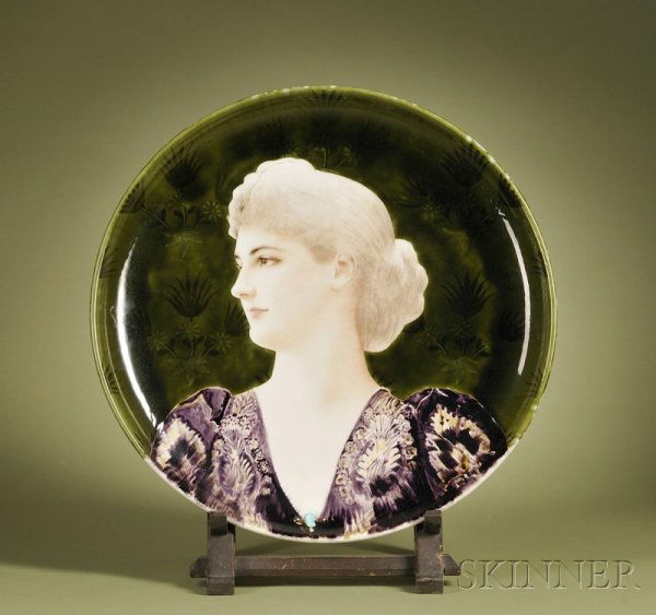 Large Theodore Deck Portrait Charger, France, seco: Large Theodore Deck Portrait Charger, France, second half 19th century, moss green ground with flowers and foliage surrounding a depiction of a lady in a purple dress, factory mark, dia. 23 1/2 in.