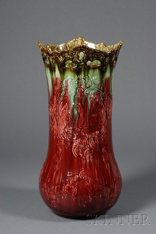 Majolica Glazed Walking Stick and Umbrella Stand, : Majolica Glazed Walking Stick and Umbrella Stand, late 19th century, mottled red and green glazes to a molded body with pierced foliate framed rim and central cartouches depicting an eagle and the US 