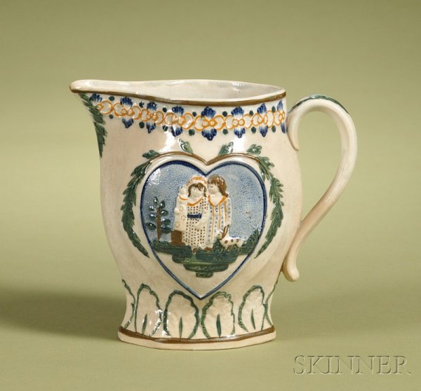 Pratt-type Pearlware Jug, England, c. 1800,: Pratt-type Pearlware Jug, England, c. 1800, underglaze polychrome enamel decorated with heart-shaped cartouches to either side depicting children in scenes of Sportive Innocence and Mischievous Sport,