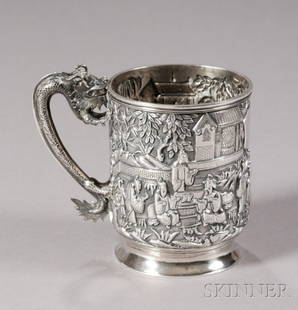 Chinese Export Silver Mug, c. 1850, the mug decorat: Chinese Export Silver Mug, c. 1850, the mug decorated with ornate repousse figures in a courtyard, with dragon handle, a shield-shaped cartouche engraved "Francis Godfrey Tarn From His Brother