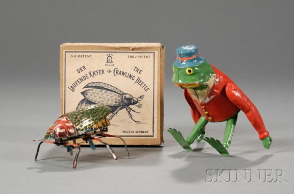 Two Tin Toys: Lehmann Crawling Beetle and a Gunthe: Two Tin Toys: Lehmann Crawling Beetle and a Guntherman Frog, Germany, late 19th/early 20th century, Lehmann clockwork "The Crawling Beetle," lithographed tin with moving legs and wings, in the origina