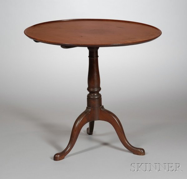 Mahogany Tilt-top Tea Table, probably Rhode Island: Mahogany Tilt-top Tea Table, probably Rhode Island, last half 18th century, the circular dished top on a vase and ring-turned support and tripod cabriole leg base ending in pad feet, old refinish, (re