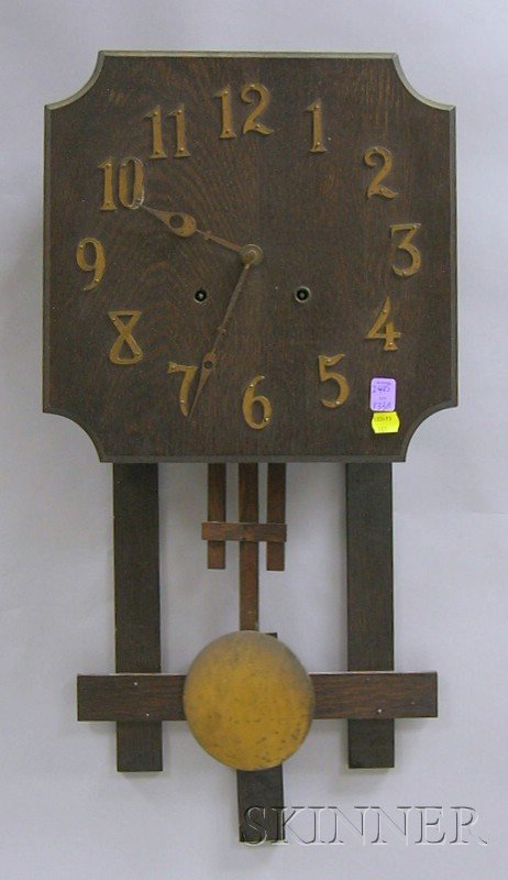 Mission Oak Wall Clock, The National Clock & Mfg.: Mission Oak Wall Clock, The National Clock & Mfg. Co., Chicago, with brass Arabic numerals and hands, eight-day time and strike movement with pendulum, ht. 26 in.