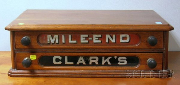 "Clark's Mile-End" Walnut and Eglomise Retail Cou: "Clark's Mile-End" Walnut and Eglomise Retail Countertop Two-Drawer Spool Cabinet, ht. 7 1/8, wd. 22 1/2, dp. 14 1/2 in.