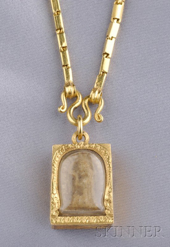 High Karat Gold Chain, the high karat gold chain su: High Karat Gold Chain, the high karat gold chain suspending an engraved 18kt gold pendant encasing a Buddhist image, 24.0 dwt, lg. 7/8, 22 1/2 in.