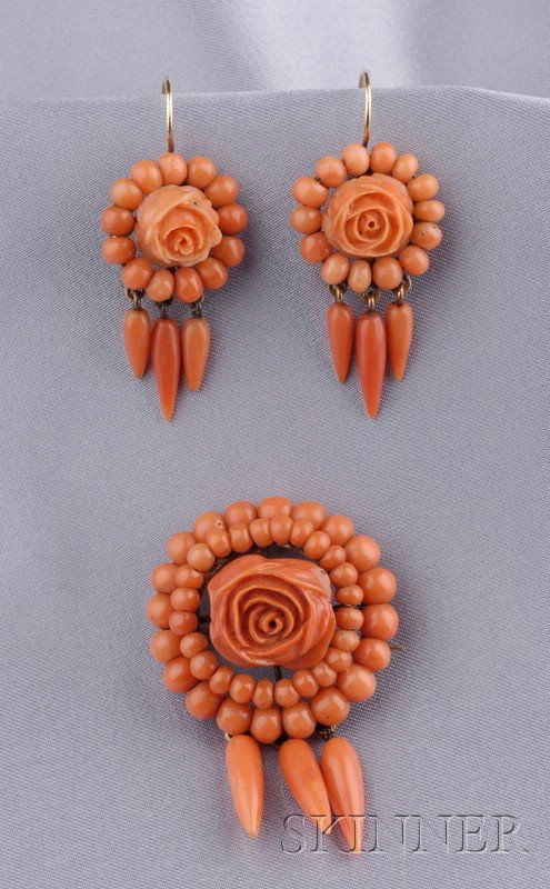 Antique 14kt Gold and Coral Demiparure, comprising: Antique 14kt Gold and Coral Demiparure, comprising brooch and earpendants designed as a carved rose framed by beads suspending a teardrop fringe, lg. 2 and 1 1/2 in.