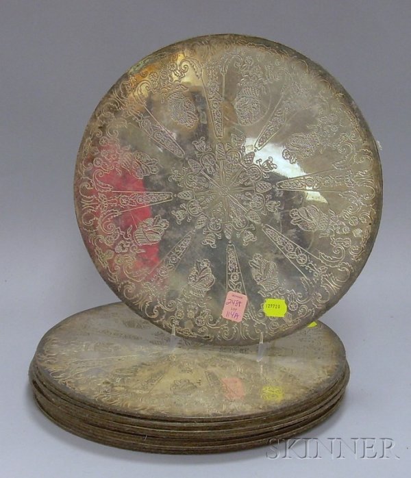 Set of Twelve Large Decorated Silver Plated Trive: Set of Twelve Large Decorated Silver Plated Trivets, dia. 11 1/4 in.