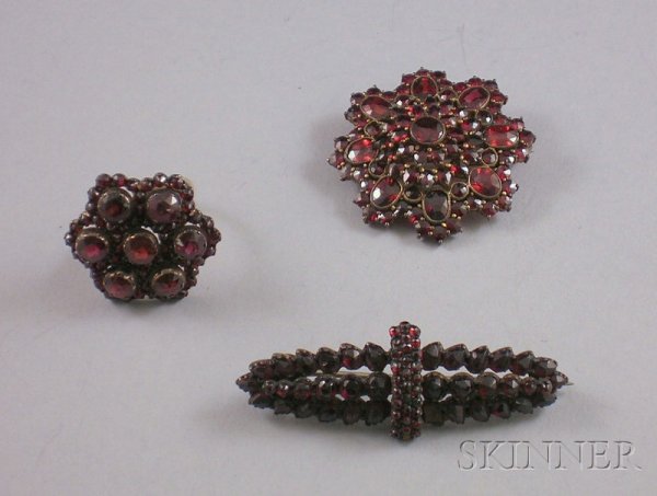 Three Antique Garnet Jewelry Items, two brooches a: Three Antique Garnet Jewelry Items, two brooches and a floriform ring, size 6.