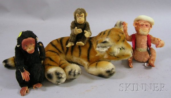 Four Stuffed Animal Toys, three seated monkeys and: Four Stuffed Animal Toys, three seated monkeys and a "Character" tiger.