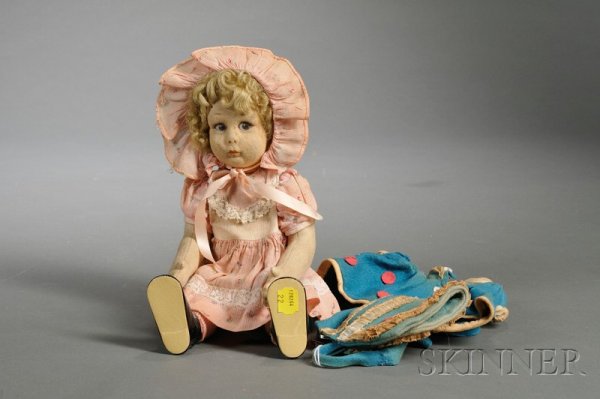 Lenci Felt Girl Doll, with closed mouth, painted l: Lenci Felt Girl Doll, with closed mouth, painted left-glancing brown eyes, wavy blonde mohair wig, swivel neck, hip, and shoulder joints, in later pink cotton print dress, bonnet, socks and shoes, ht.