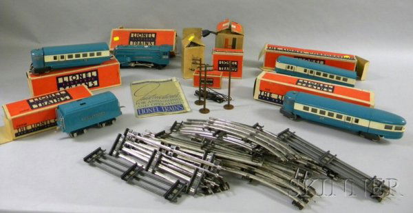 Several Pieces of Lionel Trains with Tracks, incl: Several Pieces of Lionel Trains with Tracks, including blue "Commodore Vanderbilt" engine and four cars, a Type "W" transformer, instruction manual, and track, many original boxes.