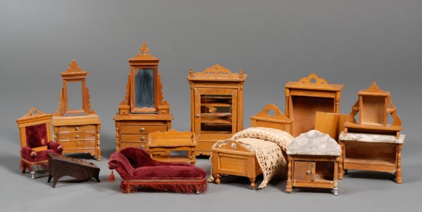 Group of German Fruitwood Dollhouse Furniture, lat: Group of German Fruitwood Dollhouse Furniture, late 19th/early 20th century, china cabinet, chest of drawers with mirror, wardrobe, three-tier serving table, sideboard with marble top, twin bed, chest