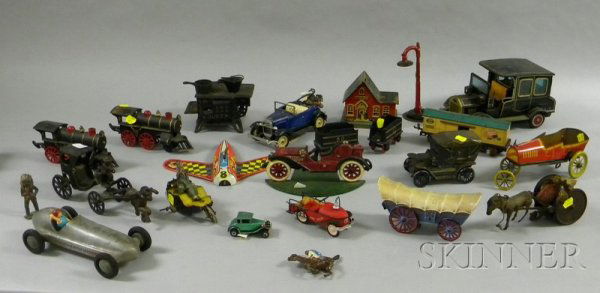 Large Lot of Painted Cast Iron, Metal, and Tin To: Large Lot of Painted Cast Iron, Metal, and Tin Toys and Figures, including cars, trains, wind-up, a tin stove, globe, Singer and Smith-Egge sewing machines, two banks, a Scottie doorstop, electric iro
