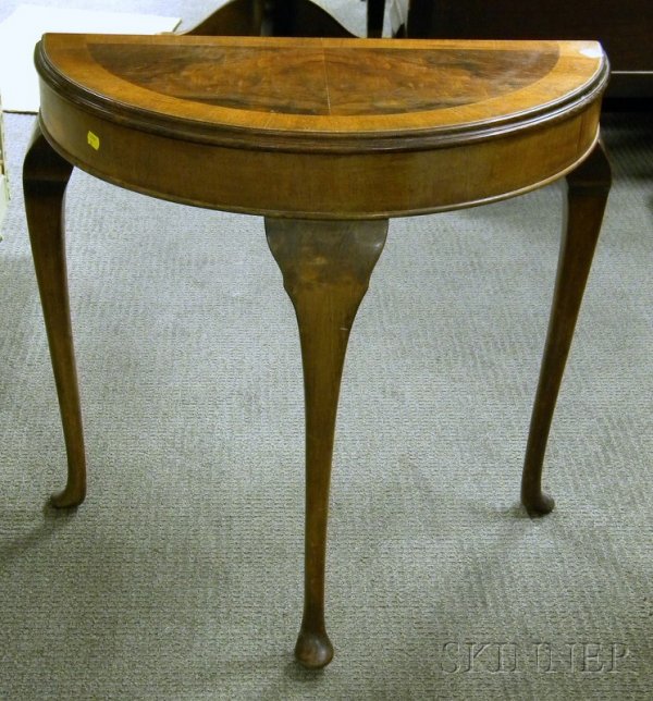 Queen Anne Style Walnut and Mahogany Veneer Demilu: Queen Anne Style Walnut and Mahogany Veneer Demilune Pier Table, with metal tag "Woonhuys, Amsterdam."