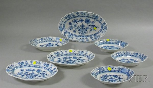 Seven Pieces of Meissen Blue Onion Pattern Porcel: Seven Pieces of Meissen Blue Onion Pattern Porcelain Serving Tableware, three platters, three open serving dishes, and an open serving dish with handles.