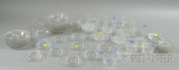 Fifty-one Pieces of Colorless Glass Tableware, th: Fifty-one Pieces of Colorless Glass Tableware, thirty-nine pieces set of cut glass cups, saucers, and small plates, seven lacy glass cup plates, and a set of five etched glass finger bowls.