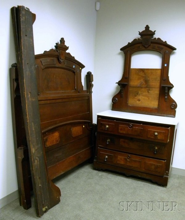 Two-piece Victorian Renaissance Revival Carved Wa: Two-piece Victorian Renaissance Revival Carved Walnut Bedroom Set, a bed with rails and a white marble-top mirrored dresser.