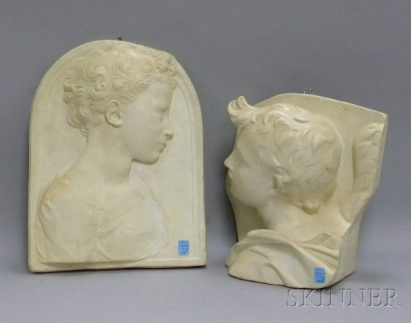 Two Ivory-painted Figural Cast Plaster Wall Plaqu: Two Ivory-painted Figural Cast Plaster Wall Plaques, P.P. Caproni Bros., Boston, one depicting a bust of a cherub, the other a profile bust of a curly haired child, ht. 11 1/2, 15 3/4 in.