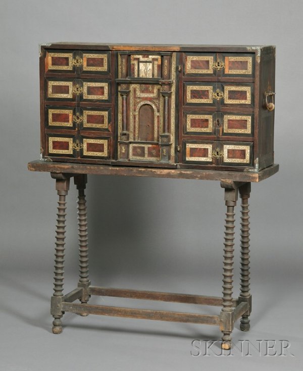 Spanish Baroque Ivory and Tortoiseshell-mounted Ca: Spanish Baroque Ivory and Tortoiseshell-mounted Cabinet on Stand, composed of antique elements, in two parts; upper section with rectangular case, fitted with nine drawers and an arched central door e