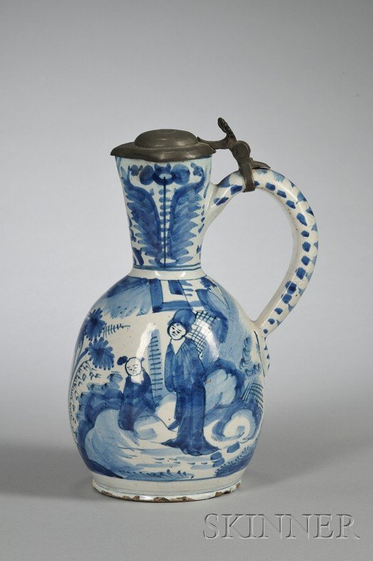 Hanau-type Tin Glazed Earthenware Krug, Germany,: Hanau-type Tin Glazed Earthenware Krug, Germany, 18th century, blue decorated with Chinese figures in a landscape, hinged pewter mount, ht. 9 3/4 in.