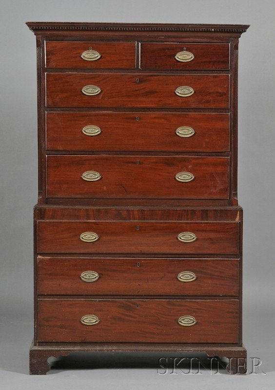 English Mahogany Chest-on-Chest, upper section wit: English Mahogany Chest-on-Chest, upper section with dentil-molded cornice above two short drawers and three long drawers and flanked by fluted pilasters; lower section with three long drawers, on brac