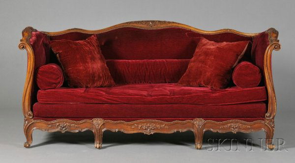 Louis XV Style Carved Beechwood Daybed, late 19th: Louis XV Style Carved Beechwood Daybed, late 19th century, serpentine frame carved with foliate sprays, short cabriole legs, red velvet upholstery, lg. 78, dp. 30 in.