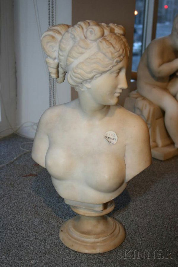 Italian Carved Alabaster Bust of Venus, 19th centu: Italian Carved Alabaster Bust of Venus, 19th century, after the antique, the nude figure with ribbons in her hair and looking to sinister, on a circular socle, ht. 14 3/4 in.