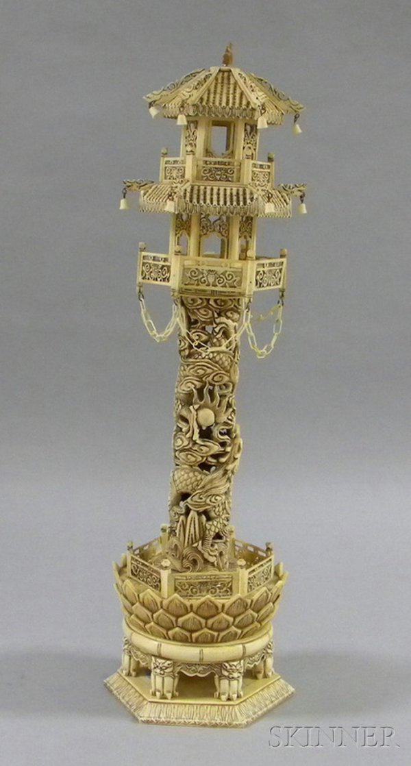 Asian Carved Bone Pagoda, central dragon decorated: Asian Carved Bone Pagoda, central dragon decorated cylinder with two floors decorated with bells, on stand, (minor losses, base needs to be reglued), approx. ht. 24 in.