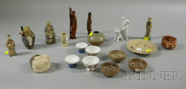 Group of Asian Figures and Sake Cups, covered cera: Group of Asian Figures and Sake Cups, covered ceramic figure, several small vases, sake cups, a figure of a man and a mythical beast, figure of an Immortal, etc.