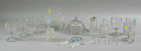 Group of Colorless Glass Tableware and Other Items: Group of Colorless Glass Tableware and Other Items, six two-mold goblets, a colorless loop pattern butter dish, a magnifying glass and letter opener, three pieces of depression glass, and eight salad 