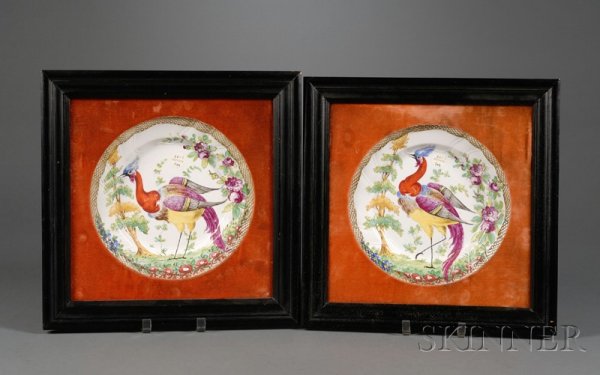 Pair of Framed Staffordshire Earthenware Hand-pain: Pair of Framed Staffordshire Earthenware Hand-painted Plates, England, 19th century, in the manner of Chelsea, polychrome enamel decorated with a basketweave border surrounding tropical birds in a flo
