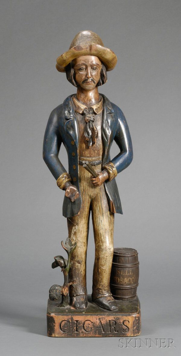 Carved and Painted Wooden Counter-top Cigar Store: Carved and Painted Wooden Counter-top Cigar Store Sailor Figure, America, late 19th century, the standing figure, wearing a red striped shirt, blue-striped trousers, and blue coat, holds three cigars