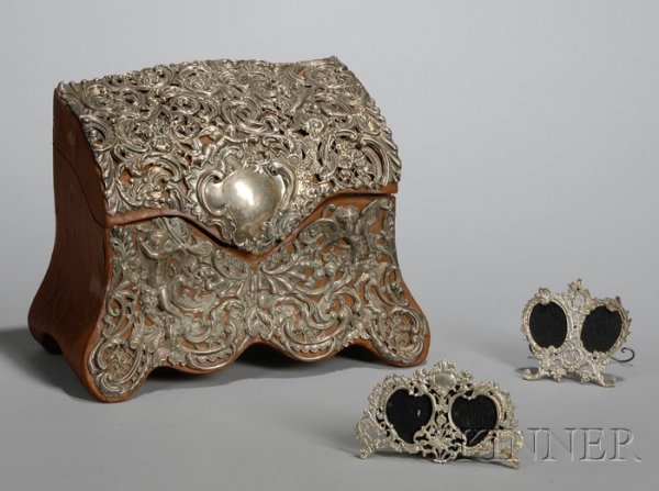 Silver Mounted Leather Box and Table Picture Frames: Silver Mounted Leather Box and Table Picture Frames, mounted silver decorated with cupids, angels, etc., ht. 8 in.