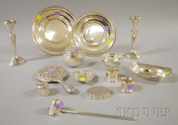 Twelve Sterling Table Articles, including a small: Twelve Sterling Table Articles, including a small Gorham bowl, a Richard Wallace plate, another plate, two napkin rings, a Gorham heart-shaped reticulated dish, a Gorham repousse-style hand mirror, a