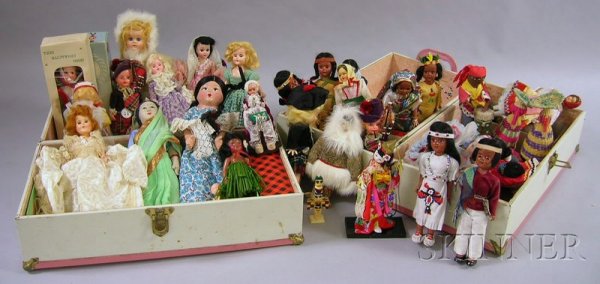 Collection of Mid-20th Century Souvenir Dolls, a : Collection of Mid-20th Century Souvenir Dolls, a Composition Doll and Four Painted Heads, in two metal doll clothing trunks.