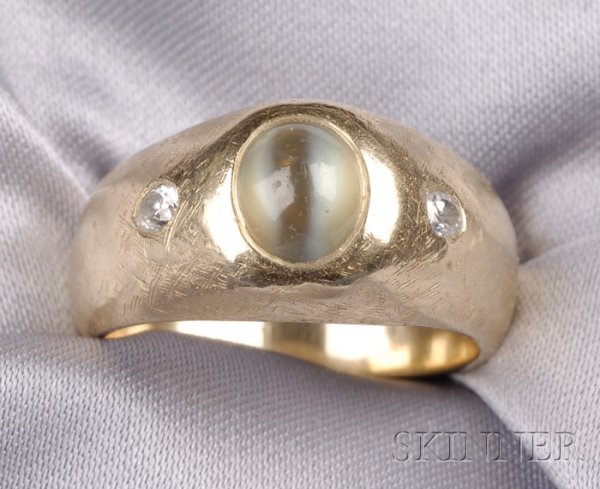14kt Gold, Cat's Eye Chrysoberyl, and Diamond Ring: 14kt Gold, Cat's Eye Chrysoberyl, and Diamond Ring, centering a cat's eye chrysoberyl measuring approx. 6.75 x 5.75 x 4.35mm, flanked by full-cut diamonds, size 8.