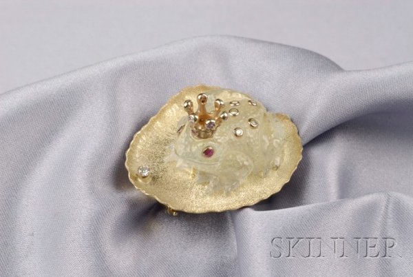 Rock Crystal, and Diamond Frog Prince Brooch, Attr: Rock Crystal, and Diamond Frog Prince Brooch, Attributed to Zadora, the carved frog seated on a gilt lily pad, gem-set 18kt gold crown and diamond warts, ruby eyes, gold findings, lg. 1 3/4 in., unsig