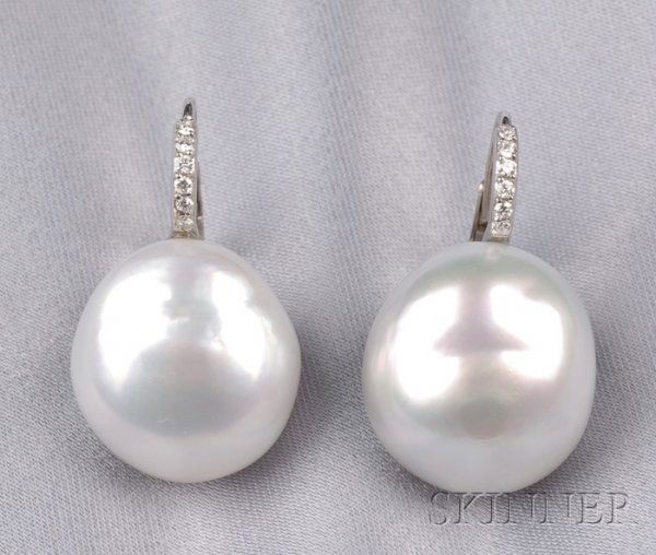 18kt White Gold, South Sea Pearl, and Diamond Earp: 18kt White Gold, South Sea Pearl, and Diamond Earpendants, Donna Vock, the bead-set diamond tops suspending a semi-baroque pearl measuring 17.90 x 16.30 and 17.20 x 15.80 mm, lg. 1 in., with maker's m