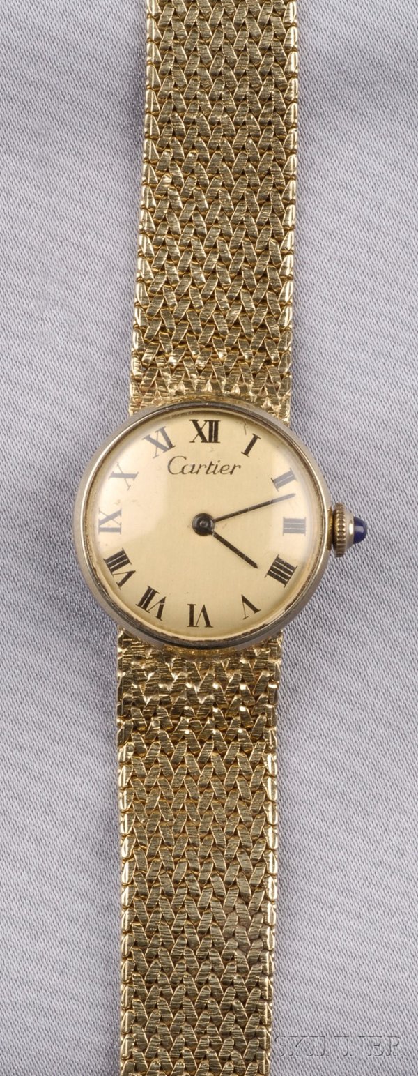 Lady's 14kt Gold Wristwatch, Cartier, the gold-ton: Lady's 14kt Gold Wristwatch, Cartier, the gold-tone dial with Roman numeral indicators, enclosing Universal Geneve 17-jewel movement, completed by a tapering mesh strap, 22 mm, 18.5 dwt (without movem